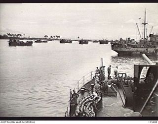 TOROKINA, BOUGAINVILLE. 1945-09-08. THE RAN FRIGATE, HMAS DIAMANTINA, ENTERING TOROKINA HARBOUR WITH MEMBERS OF THE JAPANESE SURRENDER PARTY ABOARD