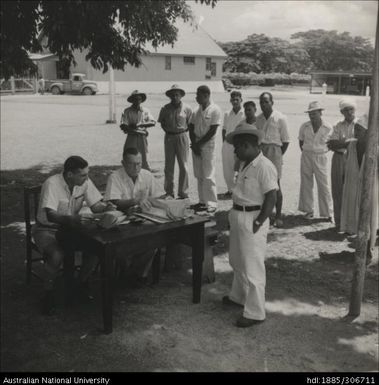 Farmers collecting wages