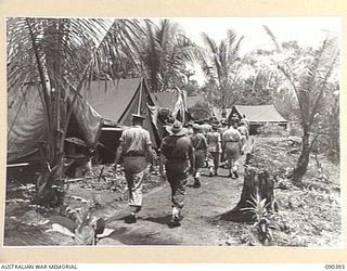 JACQUINOT BAY, NEW BRITAIN. 1945-04-08. SENATOR J.M. FRASER, ACTING MINISTER FOR THE ARMY, ACCOMPANIED BY LIEUTENANT GENERAL J. NORTHCOTT, CHIEF OF THE GENERAL STAFF, AND MR F.R. SINCLAIR, ..