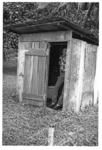 Man in small shed