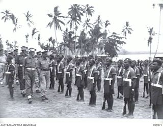 RABAUL, NEW BRITAIN, 1946-04-06. MAJOR-GENERAL B.M. MORRIS, GENERAL OFFICER COMMANDING 8 MILITARY DISTRICT, ACCOMPANIED BY SENIOR OFFICERS, INSPECTING TROOPS OF 3 NEW GUINEA INFANTRY BATTALION, ..