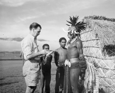 Portrait of William Dobell sketching an unidentified man in New Guinea, 1949?