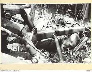 1943-09-25. NEW GUINEA. ADVANCE ON LAE. THIS WAS A JAPANESE STRONGPOST