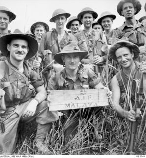 NEW GUINEA. GONA. AUSTRALIANS ON RECONNAISSANCE IN THE GONA AREA FOUND THIS PIECE OF PACKING CASE MARKED "A.I.F. MALAYA". EVIDENTLY AUSTRALIAN MATERIAL CAPTURED IN MALAYA IS BEING USED AGAINST US ..