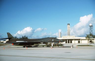 A right side view of a B-1B aircraft parked in front of the operations building during Exercise DISTANT MARINER