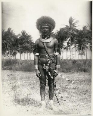 Papuan man with shell necklet and arm bands, Port Moresby, Papua, 1922 / Sarah Chinnery