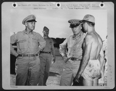 The Head Of The Army Air Forces, General Henry H. Arnold, Listens To A Report By A Surperfortress Crew Chief On Guam. Left To Right: Lt. Gen. Barney M. Giles, Commanding General Of The Aaf, Pacific Ocean Areas; Colonel Elbert D. Reynolds, Commander Of A 3 (U.S. Air Force Number 58474AC)