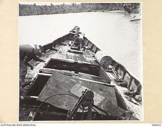 MUSCHU ISLAND, NEW GUINEA, 1945-09-11. FOLLOWING THE SURRENDER OF THE JAPANESE, MUSCHU ISLAND IS NOW UNDER THE CONTROL OF HQ 6 DIVISION. THIS PICTURE SHOWS THE AMOUNT OF DAMAGE DONE BY RAAF AIR ..