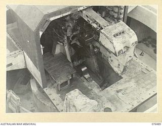 PORT MORESBY, PAPUA. 1944-10-18. ONE OF THE SHELL RECESS BODIES IN THE EMPLACEMENT DURING THE CONSTRUCTION OF THE BASILISK BATTERY OF THE 801ST ANTI-AIRCRAFT AND COAST ARTILLERY BATTERY