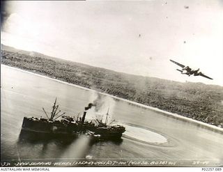 Wewak, New Guinea, 1943-09-02. Aerial photograph, taken from an altitude of one hundred feet, of a North American B25 Mitchell bomber aircraft of No. 405 Squadron, No. 38 Battle Group, United ..