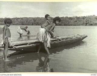 1943-02-02. NEW GUINEA. "JAP-MAN, HE GONE TAUBADA." IS NOW THE PASSWORD ALONG THE JUNGLE TRACKS OF THE PAPUAN COAST NOW, THE NATIVES KNOW BY BUSH TELEGRAPH INSTINCT, OR "MISSION TALK ENGLISH" THAT ..