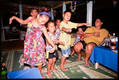 Children dancing at a party, Samoa