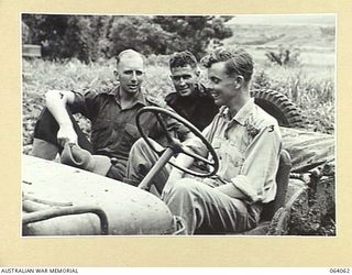 KELANOA, NEW GUINEA. 1944-01-20. THREE RHODES SCHOLARS OF THE 9TH DIVISION. THEY ARE:- VX46337 LIEUTENANT COLONEL J.H. CHINNER, ASSISTANT DIRECTOR OF ORDNANCE SERVICES, 9TH DIVISION (1); SX5467 ..