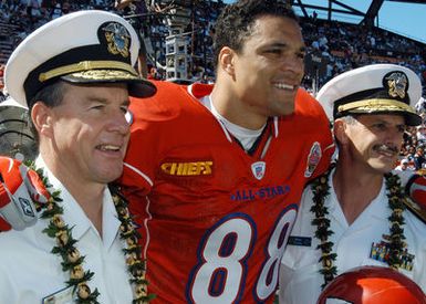 US Navy (USN) Admiral (ADM) Thomas Fargo (left), Commander, U.S. Pacific Command, and USN Rear Admiral (RDML) Michael C. Vitale, Commander, Navy Region Hawaii (HI), pose for a photograph with the Kansas City CHIEF's Tight End Tony Gonzalez (88) prior to the kickoff of the 2005 NFL (National Football League) Pro Bowl, Honolulu, HI. USN ADM Fargo performed the coin toss to start the game