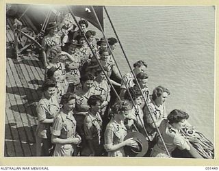 LAE, NEW GUINEA, 1945-05-07. AUSTRALIAN WOMEN'S ARMY SERVICE PERSONNEL ON THE DECK OF THE MV DUNTROON BEFORE DISEMBARKATION. THEY ARE EN ROUTE TO THE AUSTRALIAN WOMEN'S ARMY SERVICE BARRACKS AT ..