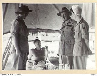 BOUGAINVILLE. 1945-06-09. GENERAL SIR THOMAS A. BLAMEY, COMMANDER-IN-CHIEF, ALLIED LAND FORCES, SOUTH WEST PACIFIC AREA (3), WITH AUSTRALIAN ARMY NURSING SERVICE MEMBERS OF THE STAFF DURING HIS ..