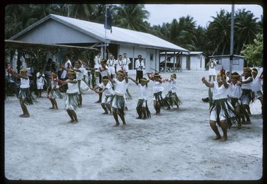 Unidentified children dancing at welcoming ceremony during Sir Arthur Porritt's state visit to Palmerston Island