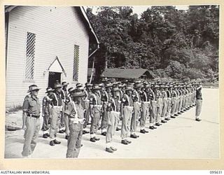 PALMALMAL, JACQUINOT BAY, NEW BRITAIN. 1945-08-27. MEMBERS OF 5 AND 11 DIVISION PROVOST COMPANIES, ATTENDING A PARADE AT THE MISSION. THESE MILITARY POLICEMEN HAVE BEEN RESPONSIBLE FOR THE ..