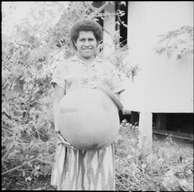 A fijian woman holding a cooking pot, Fiji, 1966 / Michael Terry