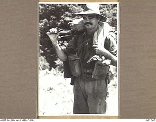 KUMBARUM, NEW GUINEA. 1943-11-30. QX20172 PRIVATE L. R. GRIFFITH OF CHARTERS TOWERS, QLD, AND OF THE 2/31ST AUSTRALIAN INFANTRY BATTALION