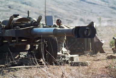 A M198 155mm Towed Howitzer from Bravo Battery, 1ST Battalion, 12th Marines, 3rd Marine Regiment from Marine Corp Base Hawaii is ready for the start of the combined arms live fire exercise. The M198 is constructed of aluminum and steel, and is air transportable by CH-53E helicopter and C-130 or larger fixed-wing aircraft. Maximum effective range with conventional ammunition is 22,400 meters (13.92 miles) and with a rocket-assisted projectile, 30,000 meters (18.64 miles)