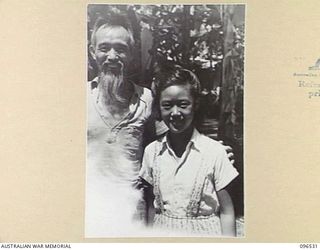 RABAUL AREA, NEW BRITAIN. 1945-09-13. CHINESE CIVILIANS, INTERNED BY THE JAPANESE AT A CAMP 15 MILES WEST OF RABAUL, WERE CONTACTED BY A PARTY OF AUSTRALIAN ARMY AND RED CROSS OFFICIALS SOON AFTER ..