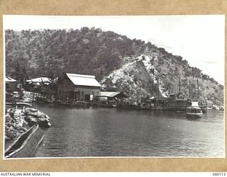 NAPA NAPA, NEW GUINEA. 1943-11-12. WORKSHOPS AND SURROUNDING AREA OF THE 2ND AUSTRALIAN WATERCRAFT WORKSHOPS, AUSTRALIAN ELECTRICAL AND MECHANICAL ENGINEERS