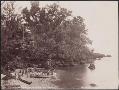 Missionaries and villagers gathered around boats on Lenga Beach, Ulawa, Solomon Islands, 1906 / J.W. Beattie