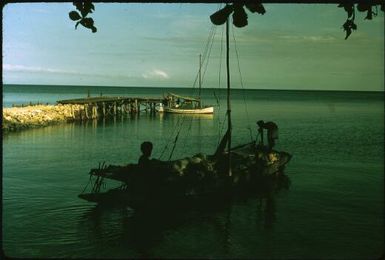 Lisu and trading canoe leaving Mapamoiwa village (1) : Mapamoiwa Station, D'Entrecasteaux Islands, Papua New Guinea, 1956-1959 / Terence and Margaret Spencer