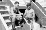 Malaysia, Republic of Fiji Military Forces soldiers shining shoes at camp