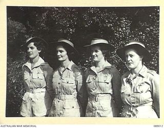 BURWOOD, SYDNEY, NEW SOUTH WALES. 1945-04-24. MEMBERS OF THE AUSTRALIAN ARMY MEDICAL WOMEN'S SERVICE OF 2/9 GENERAL HOSPITAL WHO SERVED IN THE MIDDLE EAST AND NEW GUINEA. IDENTIFIED PERSONNEL ARE: ..