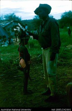 Unidentified man and child