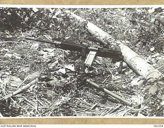 WANDOKAI, NEW GUINEA. 1944-01-01. A 7.7MM JAPANESE TYPE 92 MACHINE GUN (WOODPECKER) MOUNTED AND READY FOR ACTION FOUND BY PERSONNEL OF THE 9TH DIVISION SALVAGE UNIT