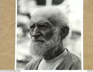 TAMIGUDU, NEW GUINEA, 1943-10-21. PORTRAIT OF REVEREND JOHANN DEKKER, AGED 79 YEARS, LUTHERAN MISSIONARY WHO HAS BEEN IN NEW GUINEA SINCE 1895. HE CARRIED ON WITH HIS WORK DURING THE JAPANESE ..