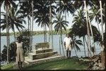 Woman and man in front of a chief memorial