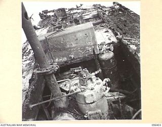 MUSCHU ISLAND, NEW GUINEA, 1945-09-11. FOLLOWING THE SURRENDER OF THE JAPANESE MUSCHU ISLAND IS NOW UNDER THE CONTROL OF HQ 6 DIVISION. THIS PICTURE SHOWS THE AMOUNT OF DAMAGE DONE BY RAAF AIR ..