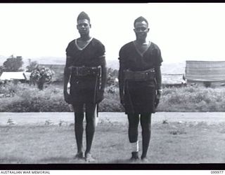 RABAUL, NEW BRITAIN, 1046-04-01. MEMBERS OF THE ROYAL PAPUAN CONSTABULARY WHO HAVE BEEN ALLOCATED THE DUTY OF POLICING AND PATROLLING THE LOCAL CHINATOWN