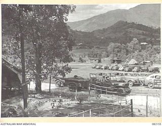 CAIRNS, QLD. 1944-10-10. THE VEHICLE PARK AT HEADQUARTERS FIRST ARMY. THE PARK WAS CREATED DURING THE MOVEMENT OF FIRST ARMY FROM MAREEBA TO LAE VIA CAIRNS AND TOWNSVILLE