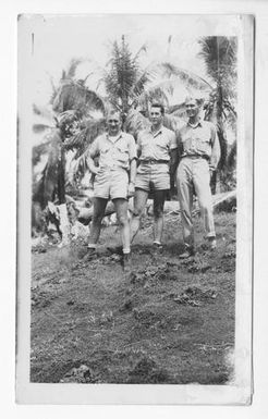 [Three Servicemen Standing in Bougainville]