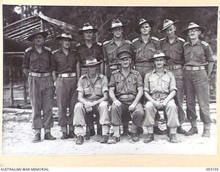 BOUGAINVILLE, 1945-06-18. LT-COL M.G. EDISON (1) AND OFFICERS OF THE HOSPITAL MEDICAL STAFF, 109 CASUALTY CLEARING STATION, MOTUPENA POINT