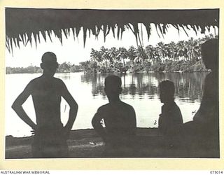 MILILAT, NEW GUINEA. 1944-08-01. A BEAUTIFUL TRANQUIL SCENE AS VIEWED FROM THE WINDOWS OF THE MEN'S MESS AT HEADQUARTERS, 5TH DIVISION. IDENTIFIED PERSONNEL ARE:- QX50765 PRIVATE L. MITCHELL (1); ..