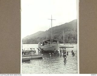 KWIARA, CHINA STRAITS, 1943-07-06. THE AM-32 AND THE 016-2 MOORED AT THE 1ST AUSTRALIAN WATER TRANSPORT GROUP MAINTENANCE BASE JETTY