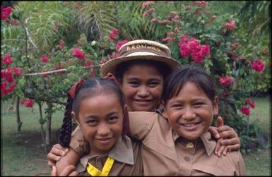 Three girls in 'Brownie' uniforms