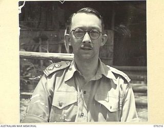 PORT MORESBY, NEW GUINEA. 1944-02-07. NX12259 LIEUTENANT COLONEL E.S. EYERS, GENERAL STAFF OFFICER INTELLIGENCE (STAFF DUTIES), PICTURED AT HEADQUARTERS, NEW GUINEA FORCE