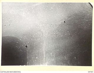 TUNNEL HILL ROAD, RABAUL, NEW BRITAIN. 1945-10-03. THE DOMED FORMATIONS IN THE CEILINGS OF TUNNELS. THE JAPANESE MADE EXTENSIVE USE OF TUNNEL SYSTEMS IN THE RABAUL AREA AFTER ABOVEGROUND ..