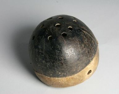 Puniu (knee drum)