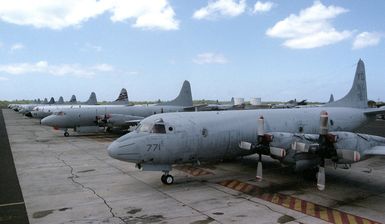 American, Australian, Canadian, Japanese, and Korean P-3 Orion aircraft sit on the tarmac at Naval Air Station Barbers Point during exercise RIMPAC 98'