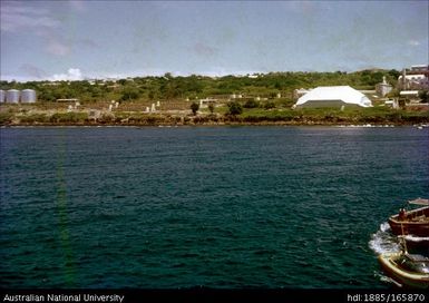 Scenic view of the bay, some fishermen visible