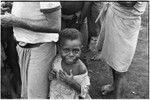 Wanumbil, Wanuma Census Division: smiling child stands beside adults