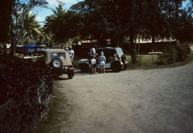 Domain entrance on cruise ship day- taxis in foreground. Nuku'alofa June 1984